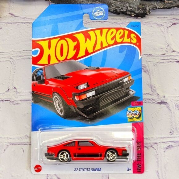 NIB Hot Wheels	'82 Toyota Supra -	HW: The '80s - HKG87	- Red - 167/250 - 10/10 - Picture 1 of 8